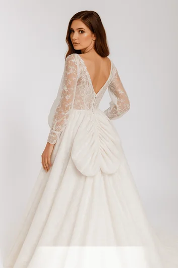 Professional Austrian bustle alterations with romantic scalloped styling